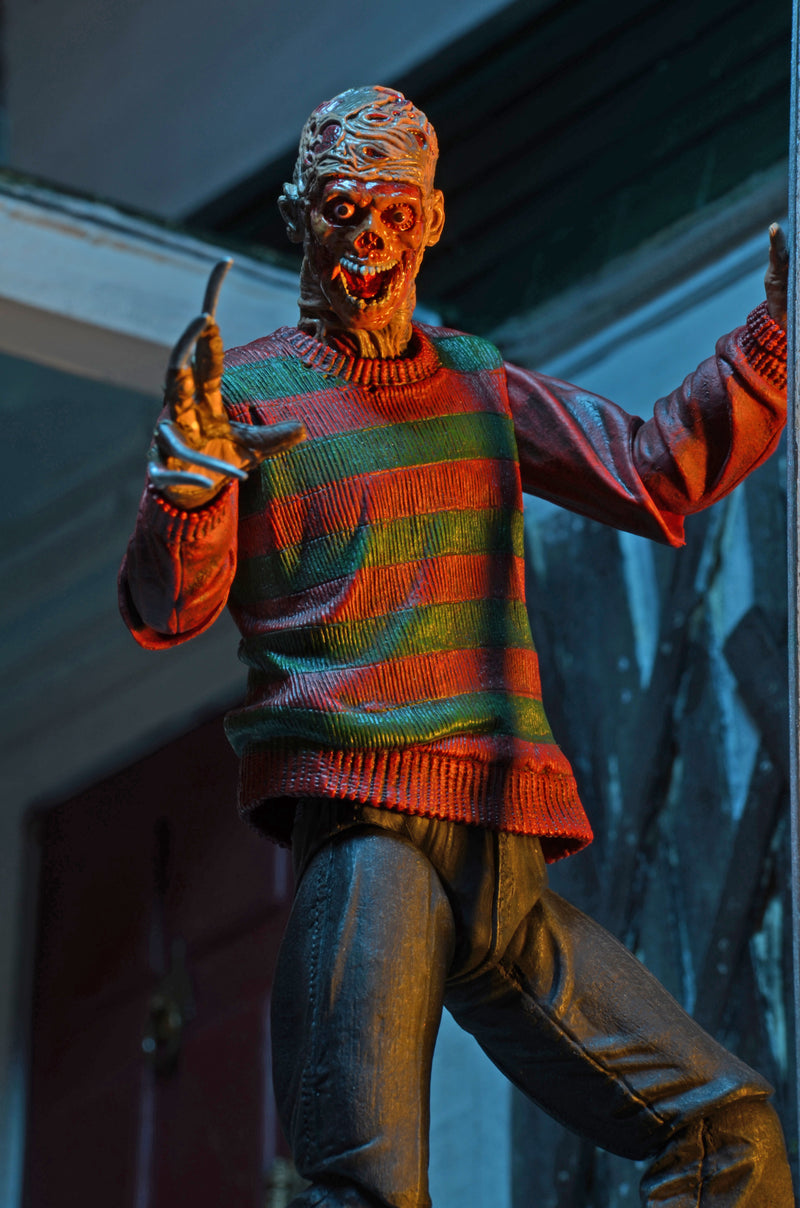 NECA Figura de Accion Ultimate: Pesadilla En La Calle Del Infierno 30 Aniversario - Freddy 7 Pulgadas