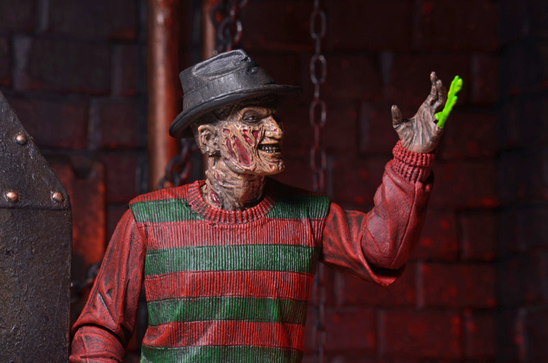 NECA Figura de Accion Ultimate: Pesadilla En La Calle Del Infierno 30 Aniversario - Freddy 7 Pulgadas