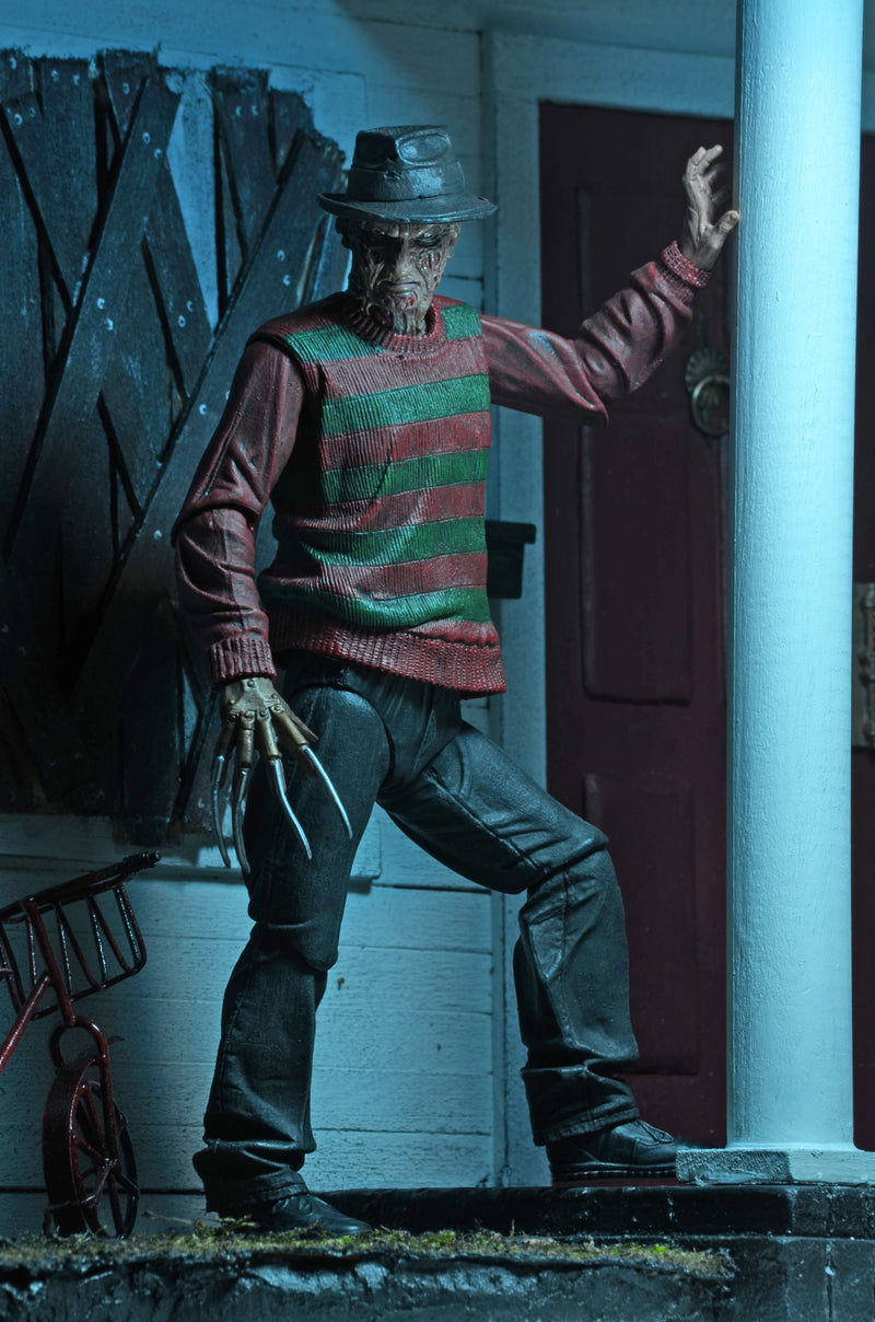 NECA Figura de Accion Ultimate: Pesadilla En La Calle Del Infierno 30 Aniversario - Freddy 7 Pulgadas